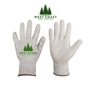 Pair of cut-resistant gloves with West Coast Tree Service branding, offering Level 5 protection against cuts and abrasions.
